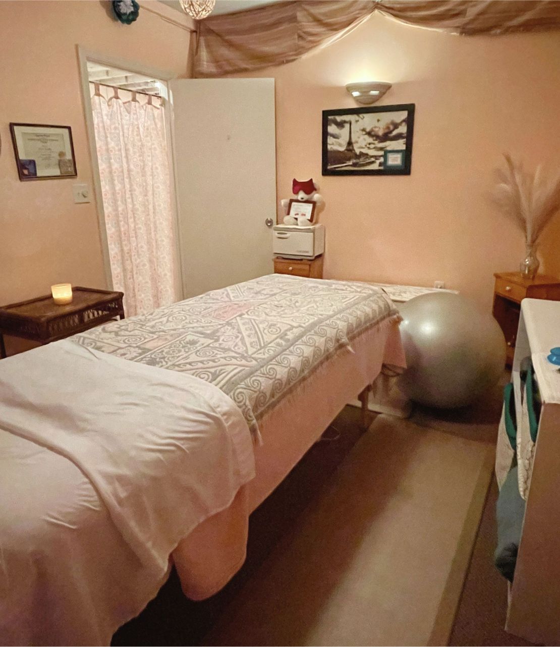Cozy peach massage room in Linden Hills